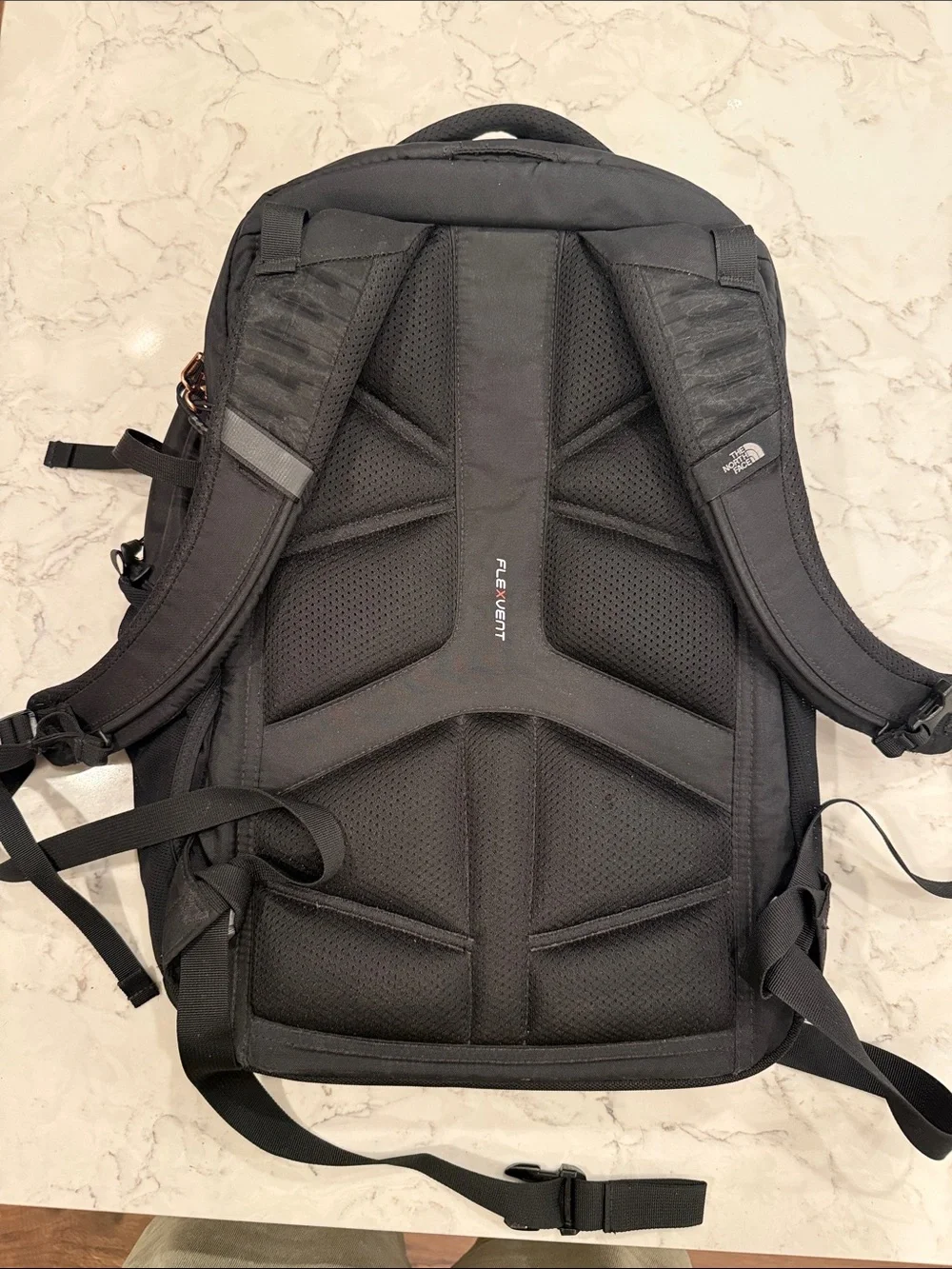 The North Face Black Backpack with Copper Zipper Accents